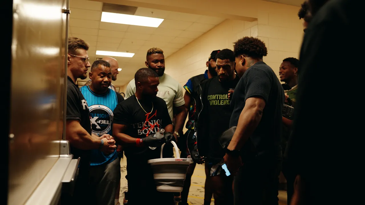 Julien Williams in the team huddle in the back hallway