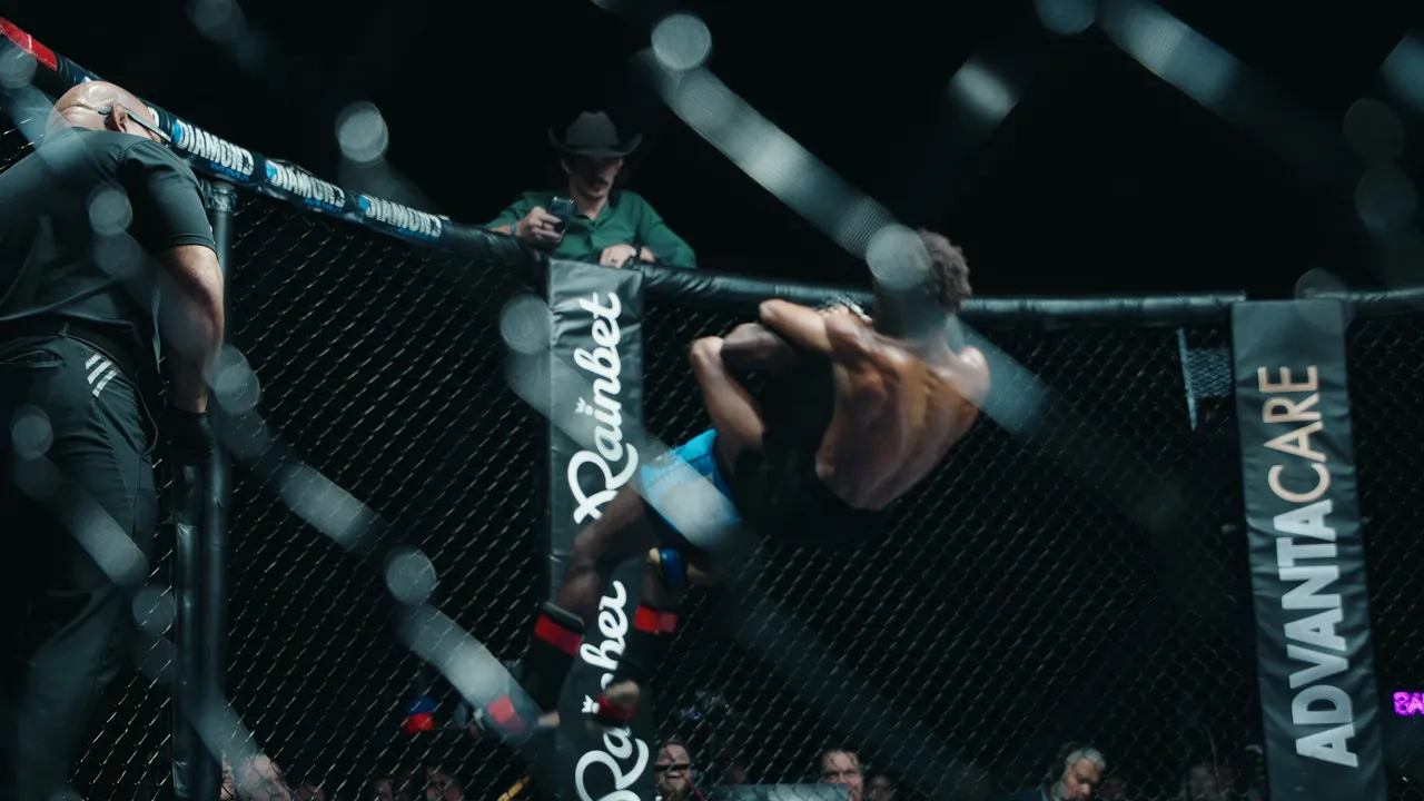 Dwjuan White lifting Tyler Sample into the finishing slam