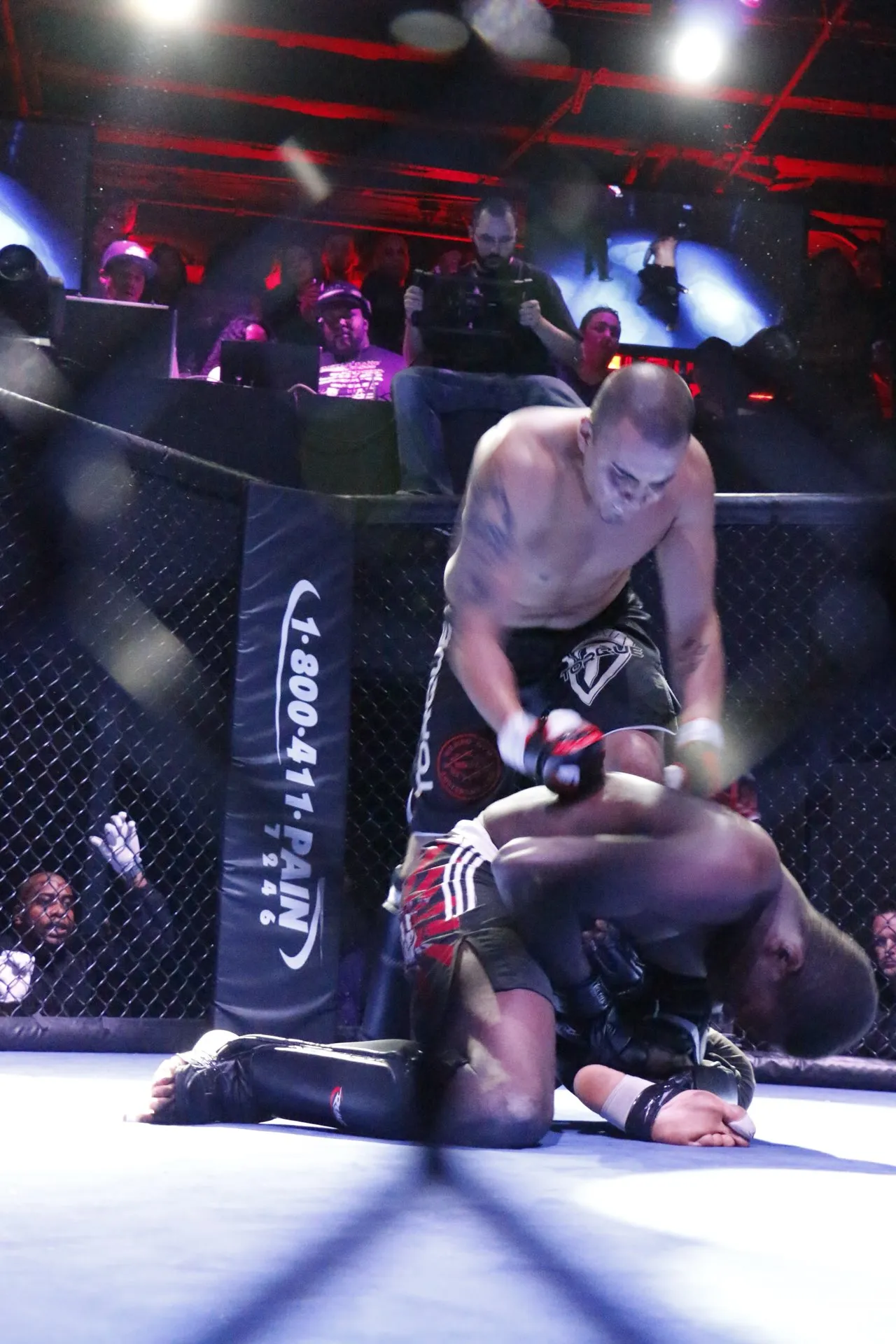 A Combat Night bout decided on the ground inside the cage