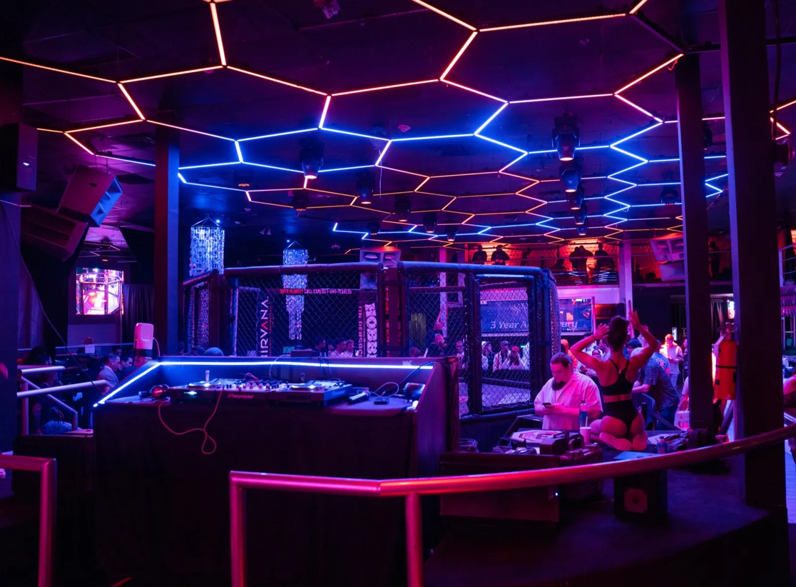 Combat Night arena under fight-night lights