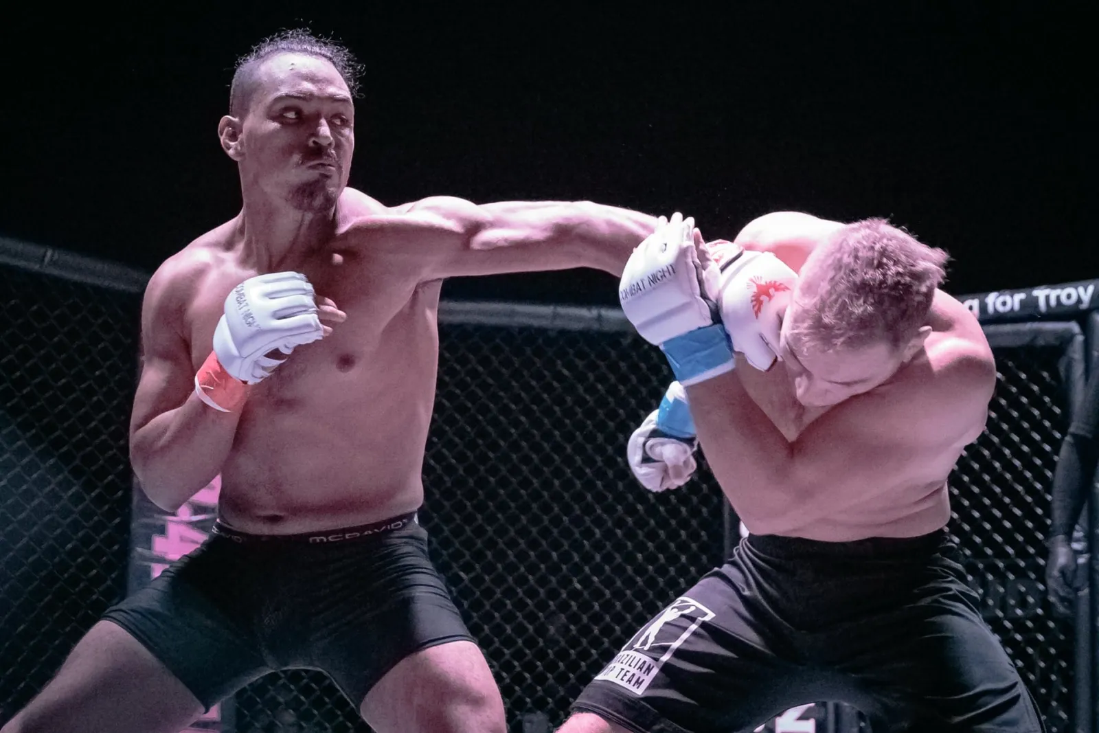 Combat Night, cage action under the lights